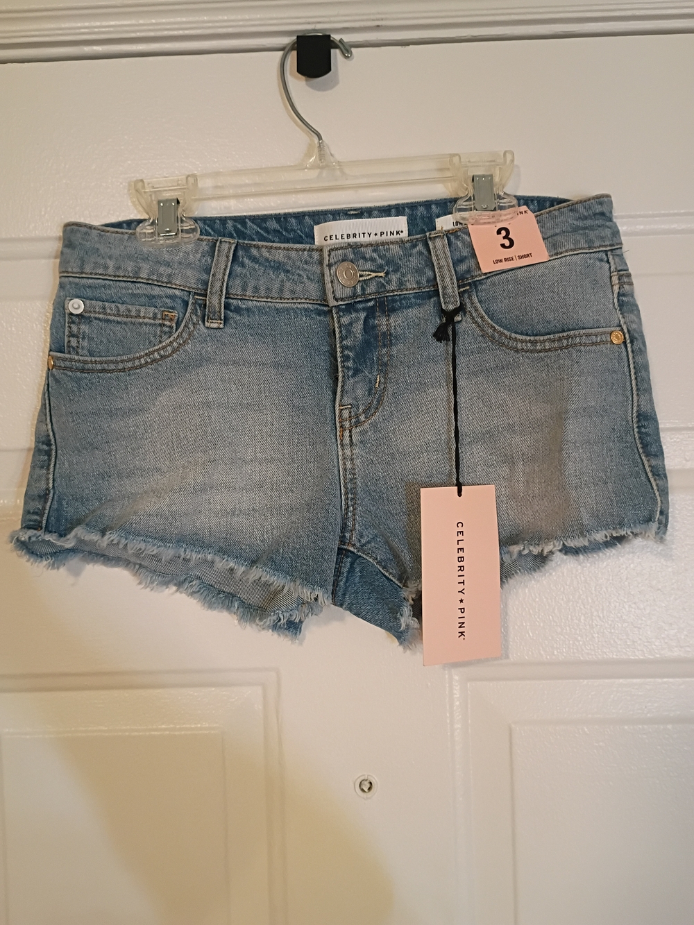 Celebrity Pink Light Wash Frayed Hem Denim Shorts
